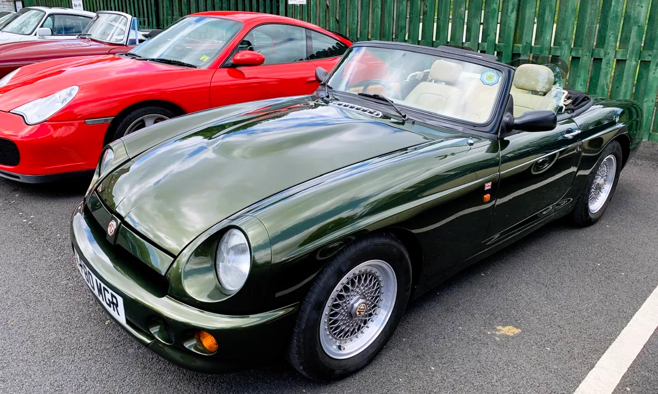 Dark-green MGB roadster displayed at a Club meeting